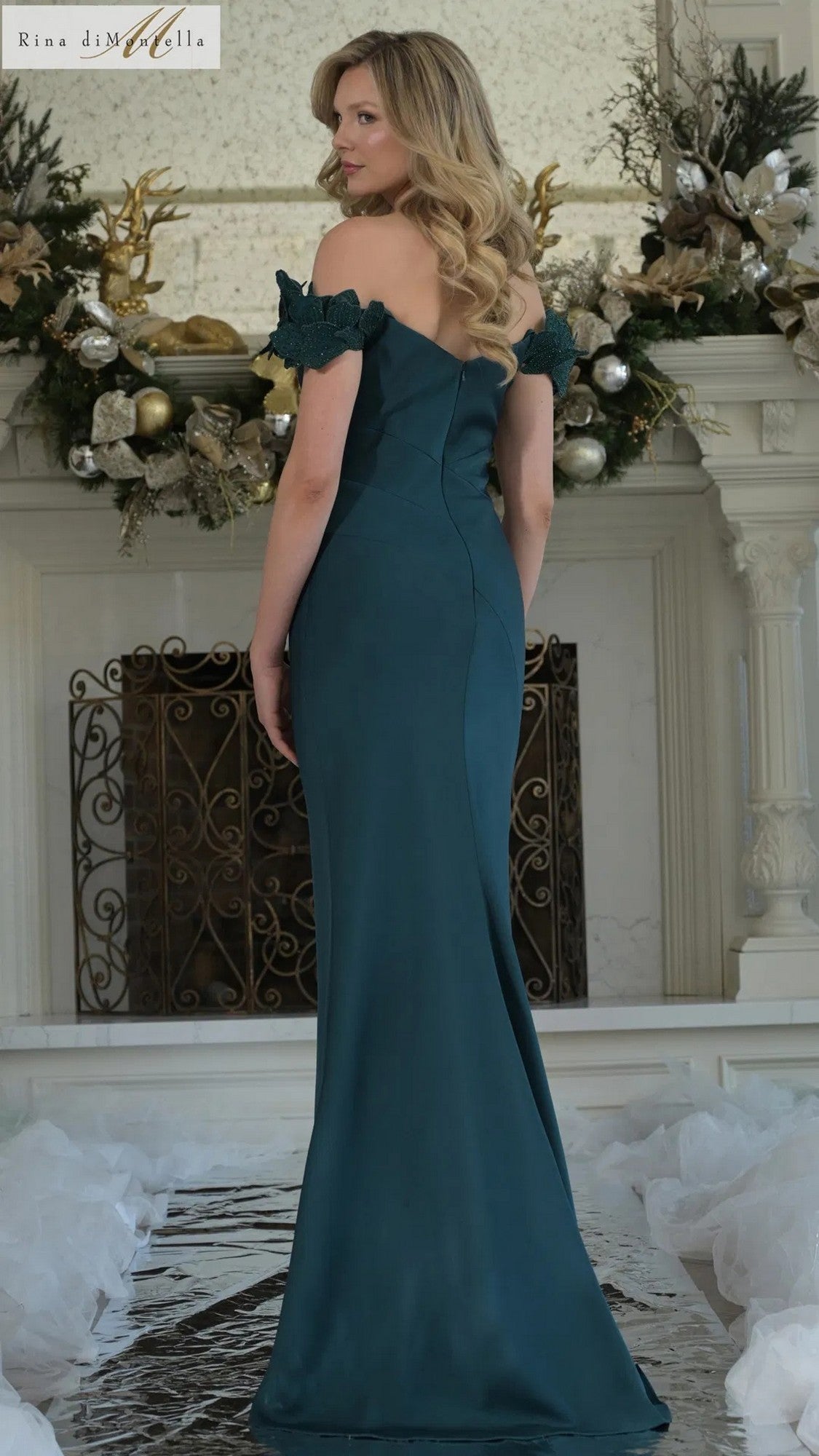 A woman in the elegant Rina Di Montella RD3325 long formal dress.